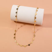 Gold star choker necklace