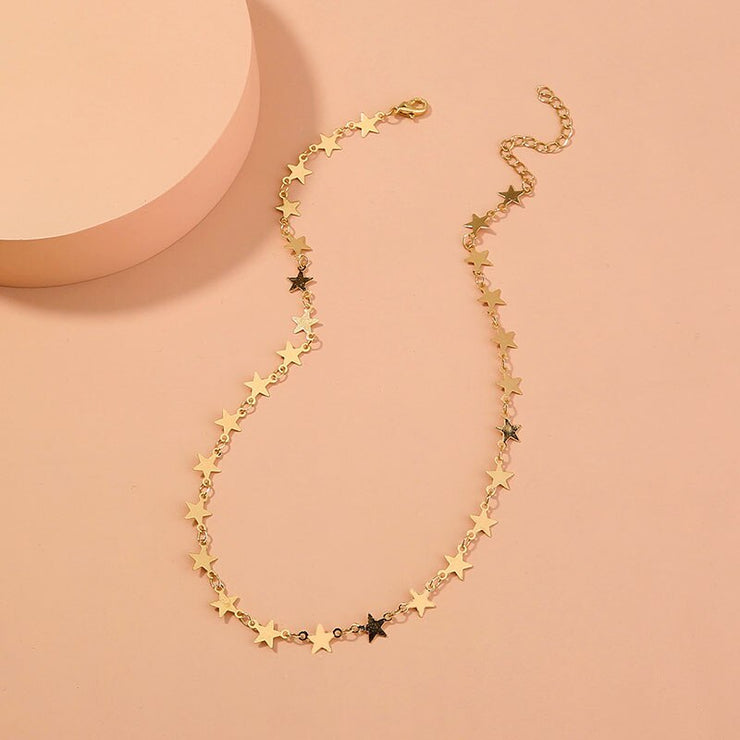 Gold star choker necklace